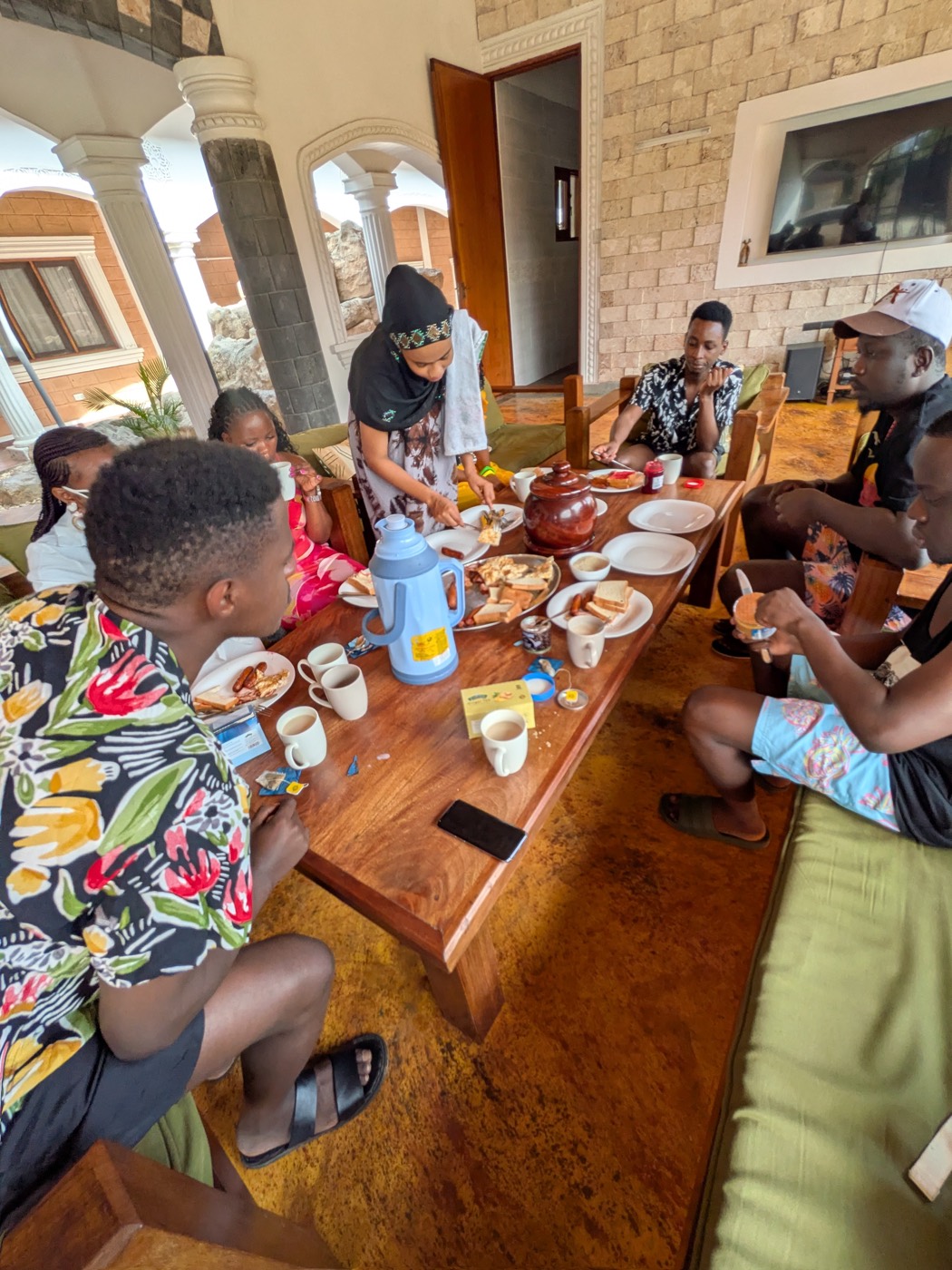 Group breakfast at a coastal villa