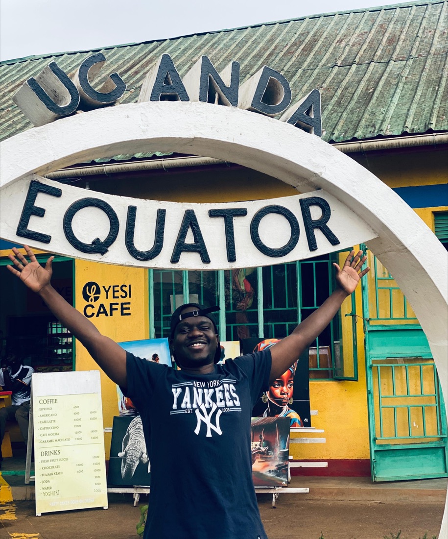 Wadada Marvin celebrating at the Uganda Equator landmark